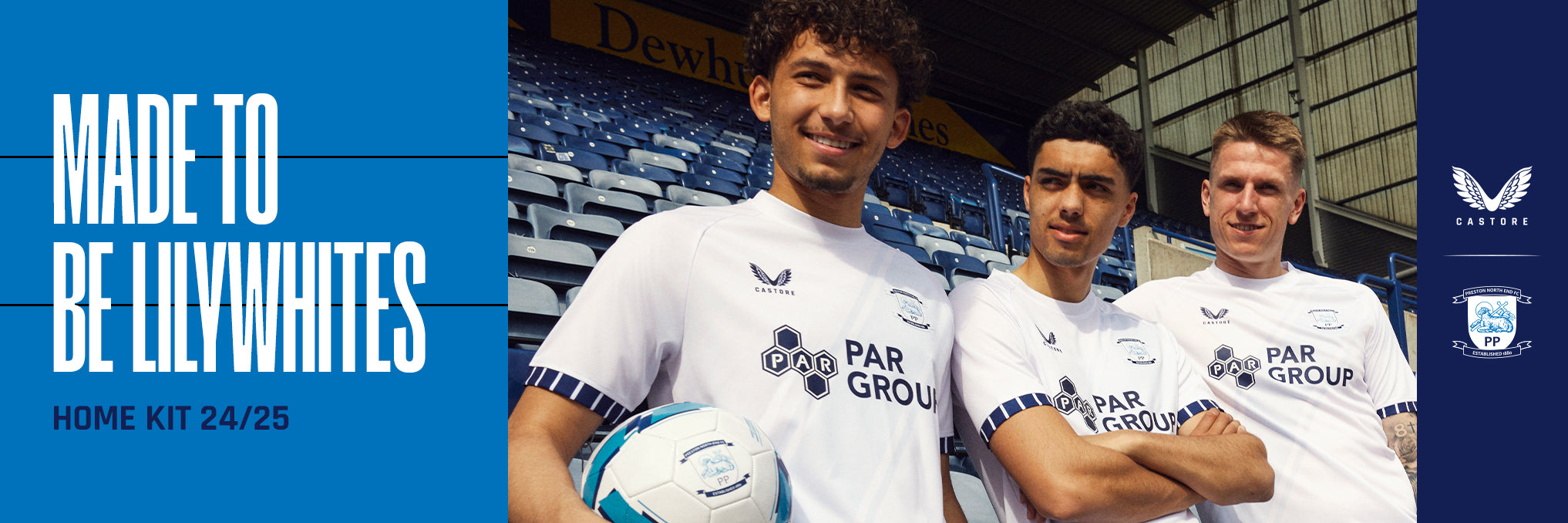 Group of three male players in white home kit posing in a stadium with blue seating