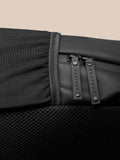 Close up of gunmetal Castore Core Backpack showing fabric texture and zipper pull detail