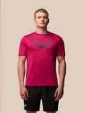 Front view of a male model wearing pink Adapt Training T-Shirt with a Castore wings graphic on the chest