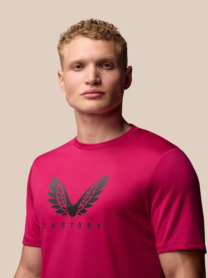 Close-up of the pink Adapt Training T-Shirt chest showing the wings graphic
