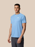 Sky blue Adapt Training T Shirt worn by model with Castore branding on chest and raglan sleeves