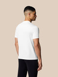 Back view of male model in white Graphic Training T-Shirt