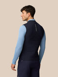 Back view of male model wearing navy Apex Training Gilet with Castore branding along the upper back.