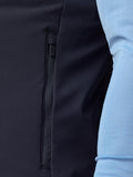 Close-up of navy Apex Training Gilet showing a zippered side pocket