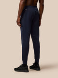 Rear view of navy joggers showing waistband with Protek branding at the back.