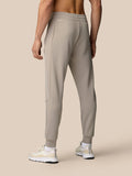 Taupe Flex Lifestyle Joggers shown from the back on a model with cuffed ankles