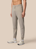 Rock grey Flex Lifestyle Joggers with zip pockets and a drawstring waist worn by a model