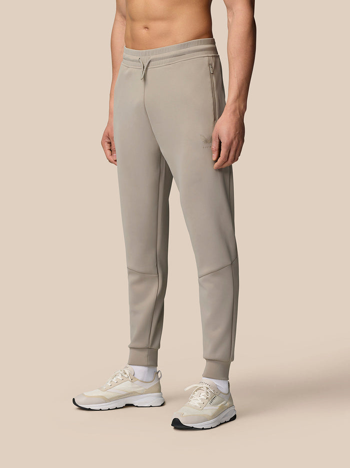 Rock grey Flex Lifestyle Joggers with zip pockets and a drawstring waist worn by a model
