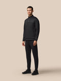 Three quarter rear view of black Flex Joggers with Protek branding at the left rear and seam detailing
