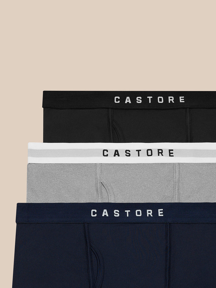 Four Castore boxer shorts in black white gray and navy with branded waistbands