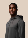 Male model wearing charcoal Flex Lifestyle Full Zip jacket with hood and front zip.