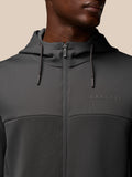 Close-up of charcoal Flex Lifestyle Full Zip jacket showing hood drawcords and chest branding.