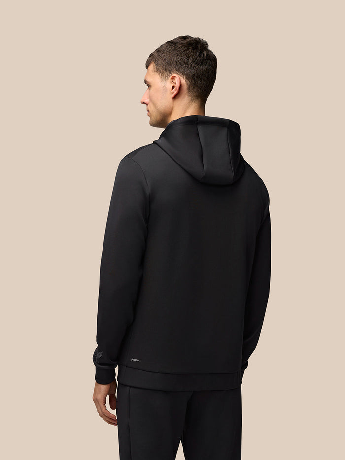 Back view of black Castore Flex Long Sleeve Hoodie showing ProTek branding at the lower back and Castore logo on the left cuff