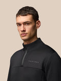 Front view of black Flex Lifestyle 1/4 Zip top featuring a chest zip and Castore logo on the left chest