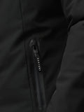 Close-up of the front zipper on the black longline wadded jacket with CASTORE pull.