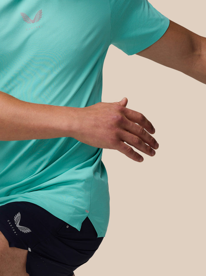 Close-up of the chest area on a light aqua Zone Training T-Shirt highlighting the logo and smooth fabric