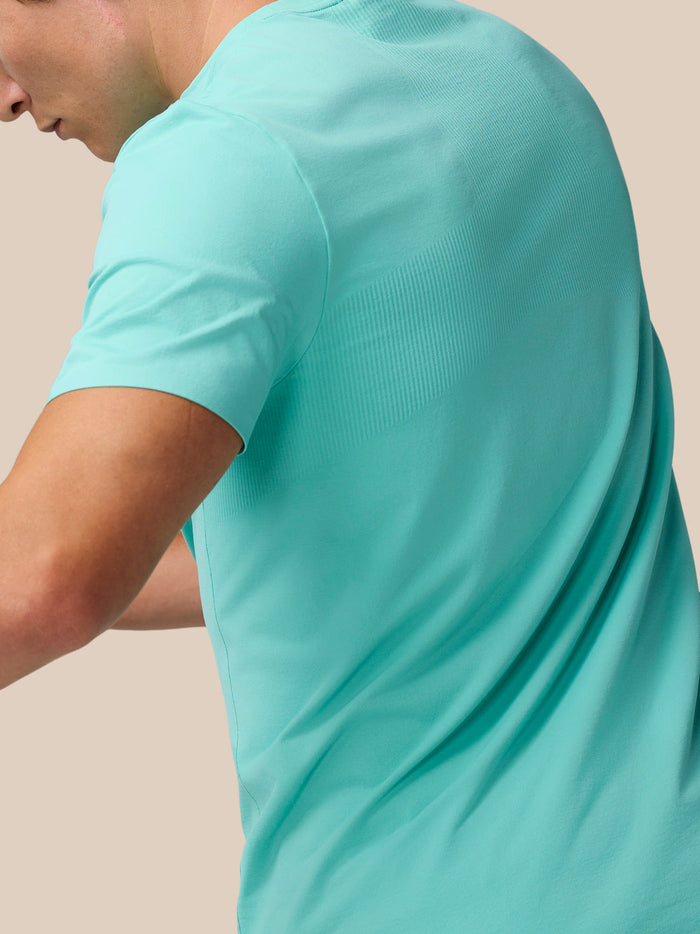 Back view of light aqua Zone Training T-Shirt displaying ribbed shoulder panel and smooth fabric.