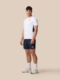 Male model wearing white Apex Training T Shirt for workouts