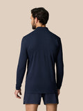 Back view of Zone Training 1/4 Zip Top in midnight navy with engineered knit panels and a dropped curved hem