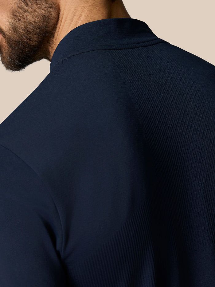 Shoulder close up of Zone Training 1/4 Zip Top in midnight navy highlighting ribbed knit texture and seam detail