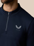 Close up of midnight navy Zone Training 1/4 Zip Top showing front zip collar and Castore logo on chest