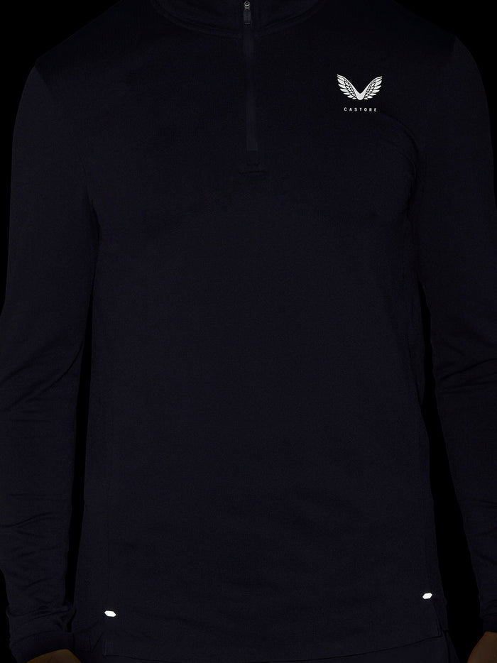 Zone Training 1/4 Zip Top in black with quarter zip and Castore wing logo on the chest