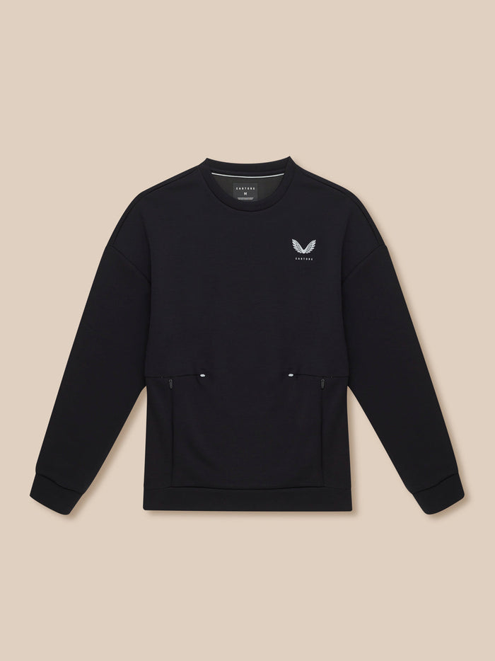 Black crewneck sweatshirt laid flat with white wing logo on left chest and zip pockets