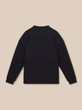 Back view of a black crew neck sweatshirt laid flat on a beige background