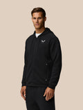 Black Travel Zip Hoodie worn by a model with front zipper and left chest logo