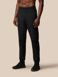 Black Flex Winterised Woven Joggers with elastic cuffs and textured lower leg panels.