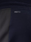 Close-up of navy fabric with ProTek branding and water droplets.