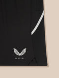 Back view of black Apex shorts with elastic waistband and white side stripe near hem and Castore logo