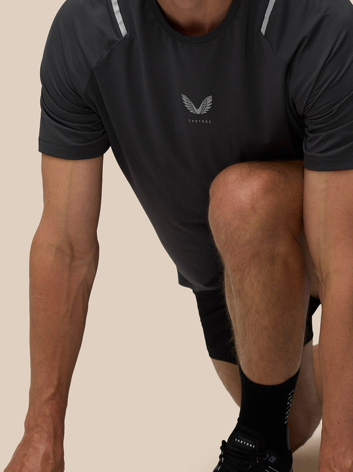 Apex Training T Shirt gunmetal color with Castore logo centered on the chest and reflective shoulder accents.