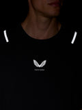 Close up of black Apex Training T Shirt showing Castore logo at the center chest and reflective shoulder hits.