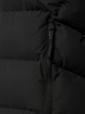 Close up of black puffer fabric highlighting stitched panels and matte finish