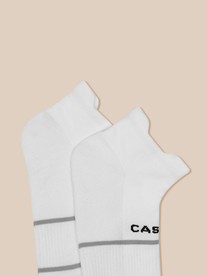 White Castore ankle socks with grey stripes from a three pack