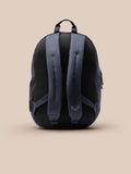 Navy backpack back view showing padded back and adjustable straps with Castore logo