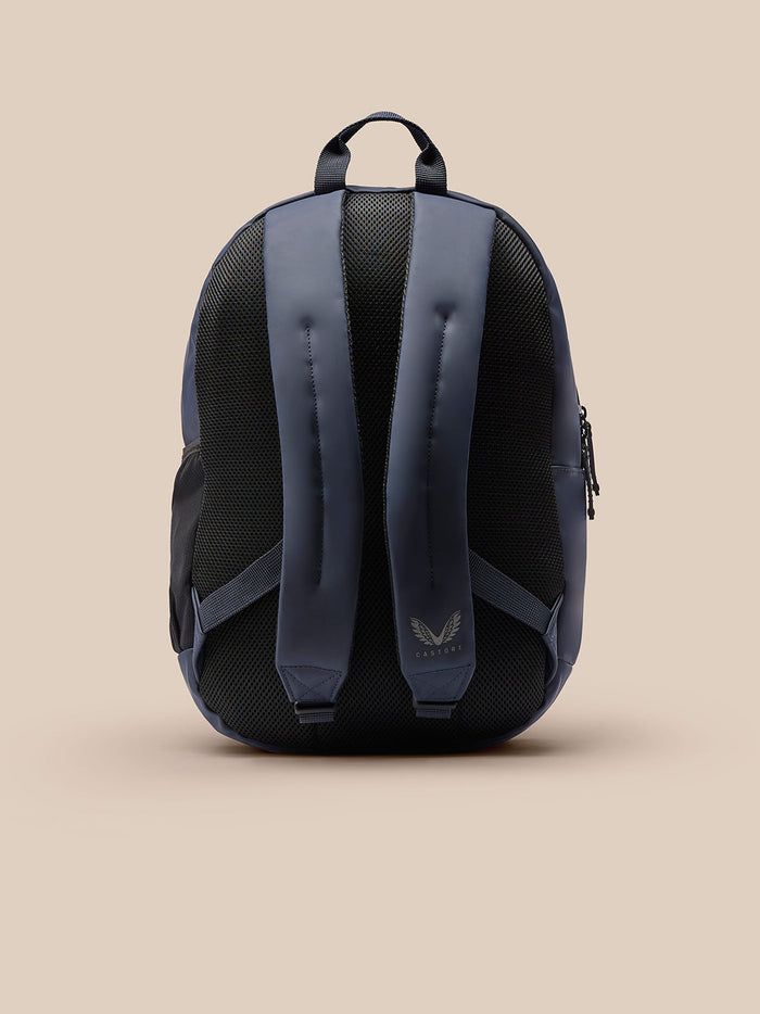 Navy backpack back view showing padded back and adjustable straps with Castore logo