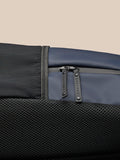 Core Backpack Midnight Navy close up of twin zippers and mesh back panel.