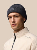 Grey knit beanie with Castore logo patch on the front
