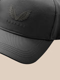 Close-up of charcoal cap side showing stitched brim and Castore branding.