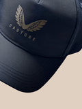 Detail view of navy cap featuring PROTEK branding along the side and a curved visor.