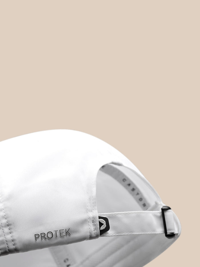 Back view of white nylon cap with adjustable strap and Protek branding