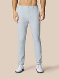 Male model wearing mid grey Golf Club Trousers with front fly, open side pockets and back welt pocket.