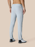 Back view of a man wearing light grey Castore Golf Club Trousers showing belt loops and rear pocket.