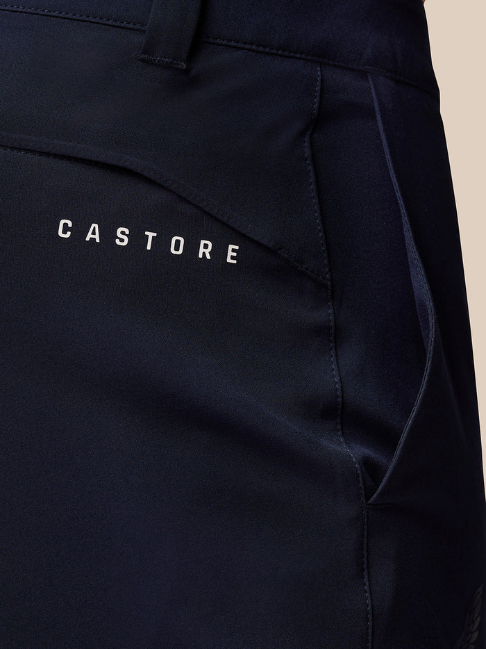 Close up of navy Golf Lightweight Club Trousers showing CASTORE branding along the right thigh pocket
