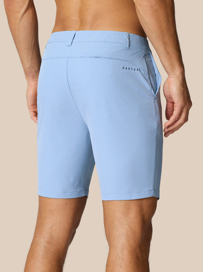 Close-up of light blue Golf Club shorts from the back highlighting belt loops and Castore branding.