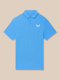 Close up of a light blue Golf Club Essential Polo showing the collar and Castore logo on the chest.