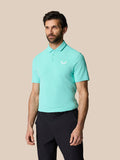 Man modeling light aqua Golf Club Essential Polo with white logo on chest