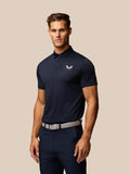 Navy Pinnacle Pique Stripe golf polo with stripe texture, three button collar and Castore logo on left chest.